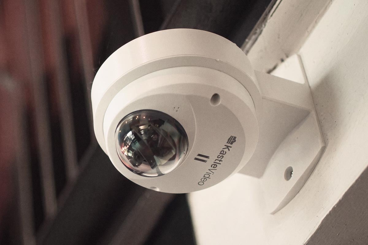 Remote monitoring security camera installed on a commercial property.